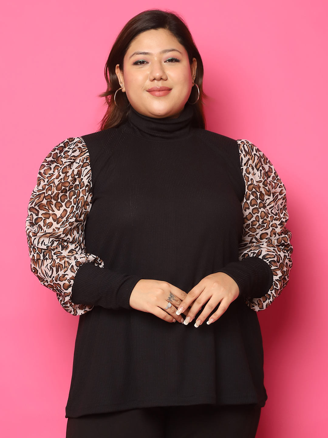 Women's Plus Size Black solid color knitted Longline Top with attached animal printed georgette arm