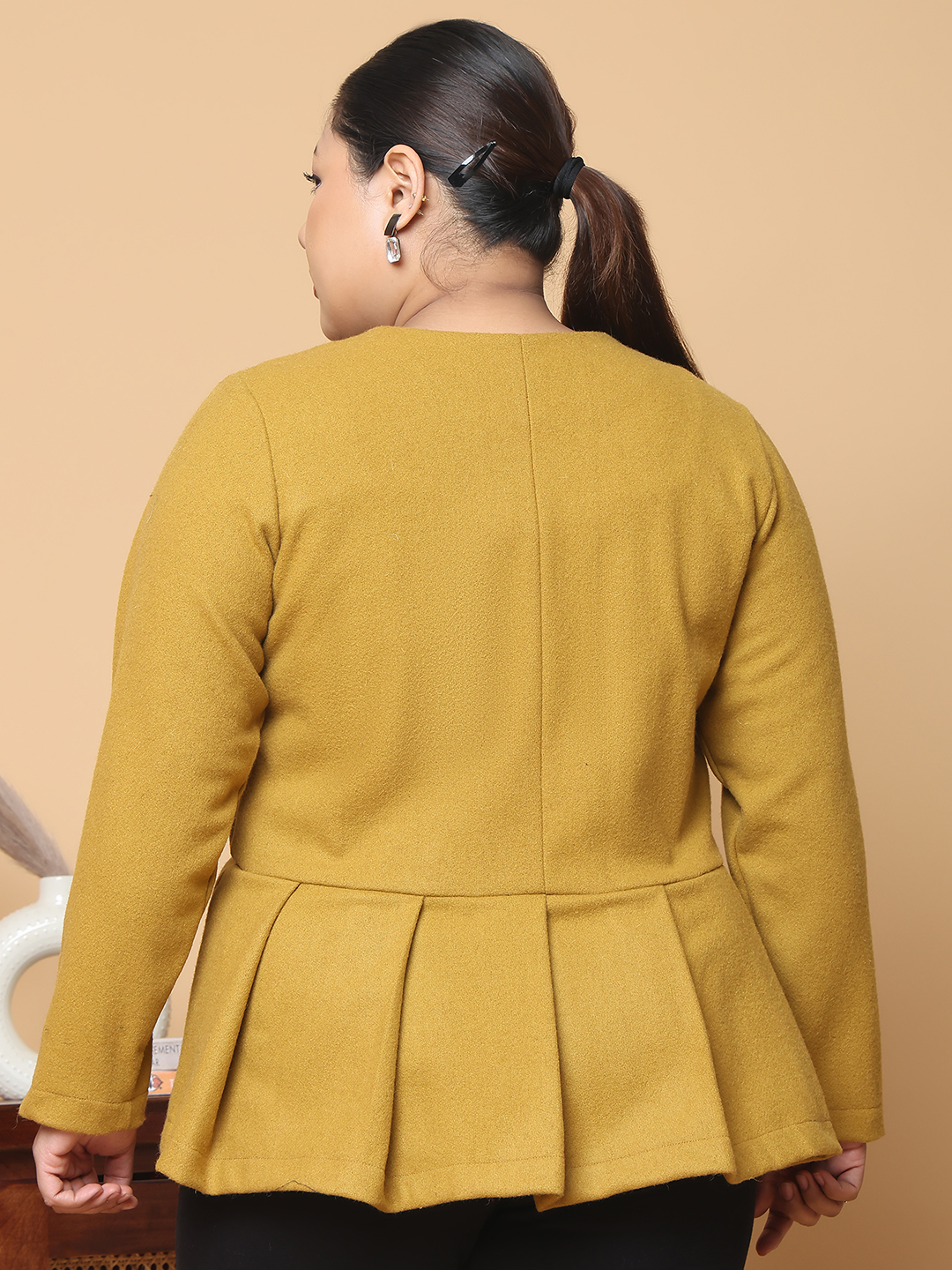 Women's Plus Size Mustard Solid Color Felt winter Peplum Jacket, has a round neck, front open button closures, long sleeves, pleated detail and straight hem.