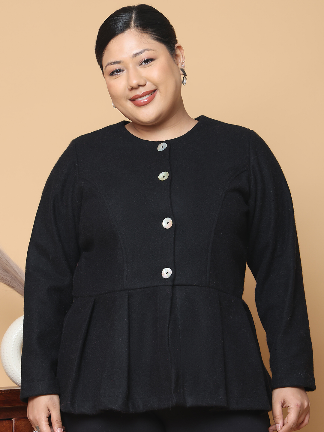 Women's Plus Size Black Solid Color Felt winter Peplum Jacket, has a round neck, front open button closures, long sleeves, pleated detail and straight hem.