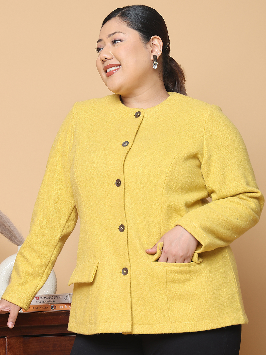 Women's Plus Size Mustard Solid Color Felt winter Jacket, has a round neck, front open button closures, long sleeves, two front flap pockets and straight hem.
